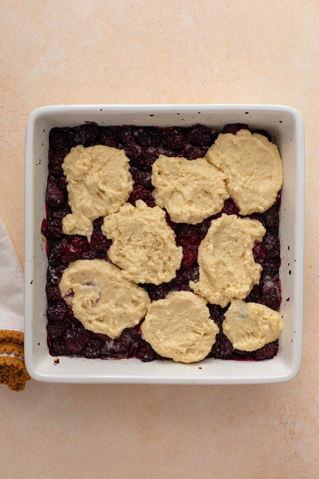 Biscuit topping dropped over par-baked blackberry filling.