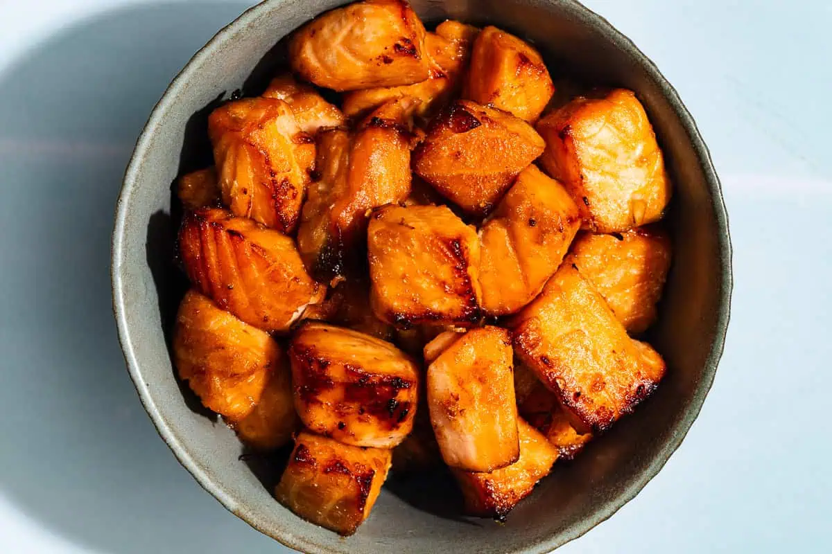 Air fried salmon bites in a bowl.