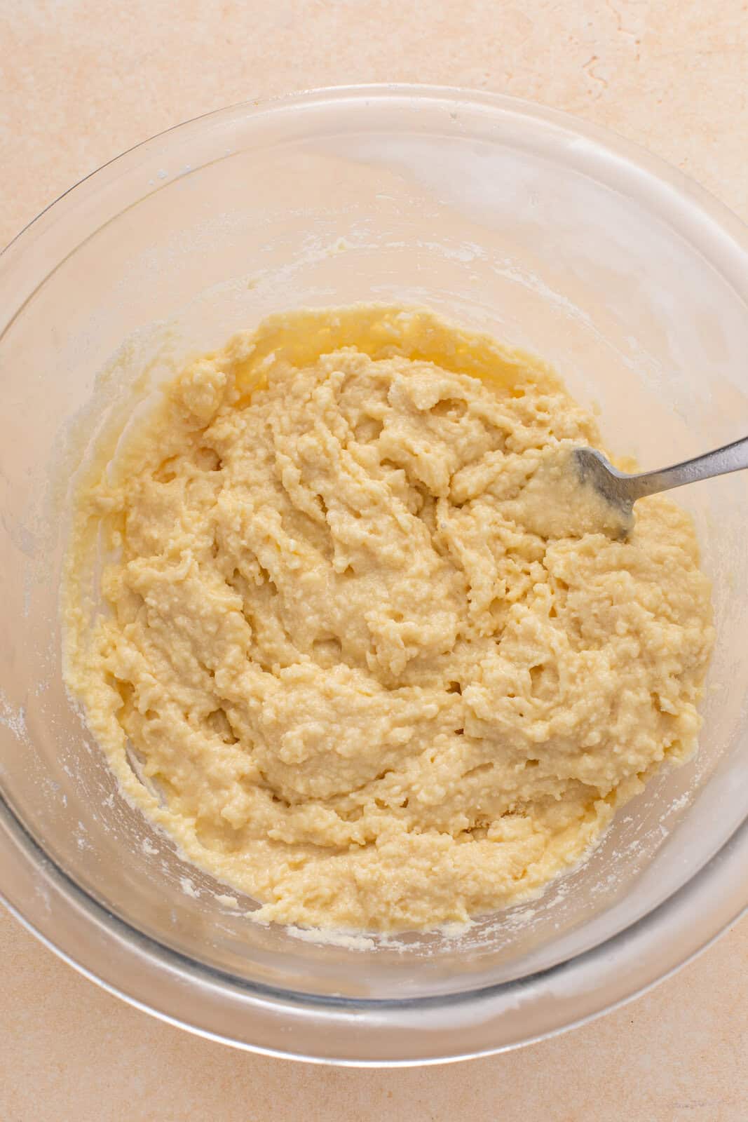 Cobbler topping being mixed with a fork.