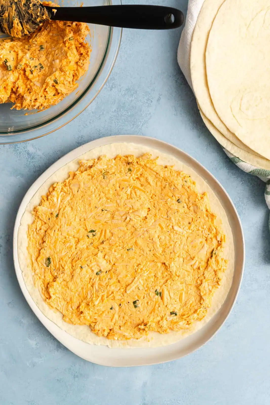 Large flour tortilla spread with buffalo chicken filling.