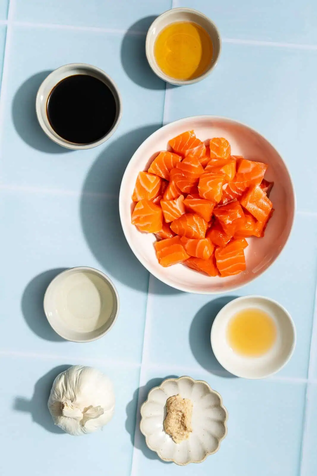 Ingredients for salmon bites arranged on a countertop.