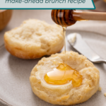 Honey being drizzled onto a halved and buttered angel biscuit on a plate. Text overlay includes recipe name.