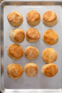 Baked angel biscuits on a baking sheet.