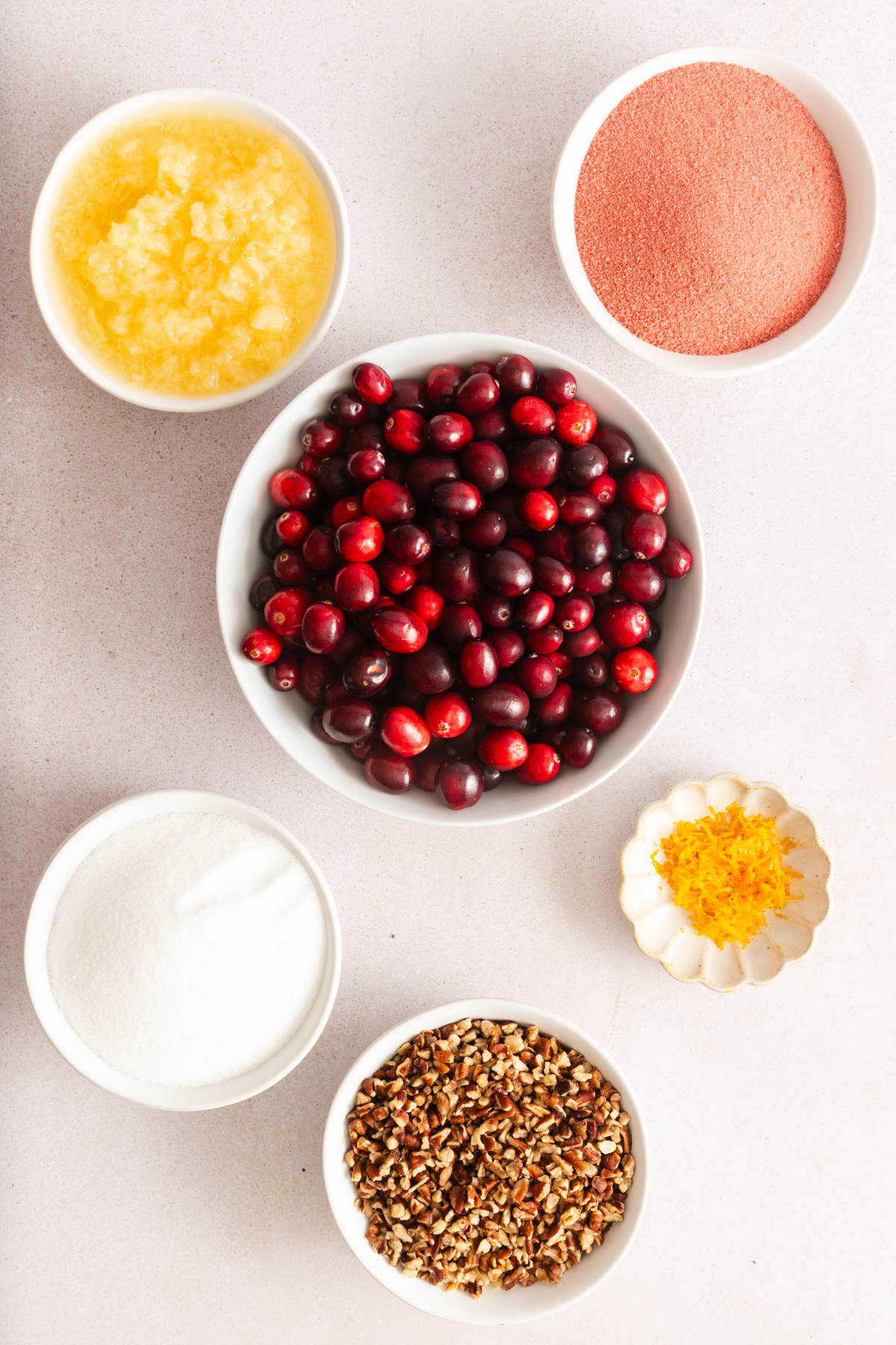 Ingredients for cranberry jello salad arranged on a countertop.