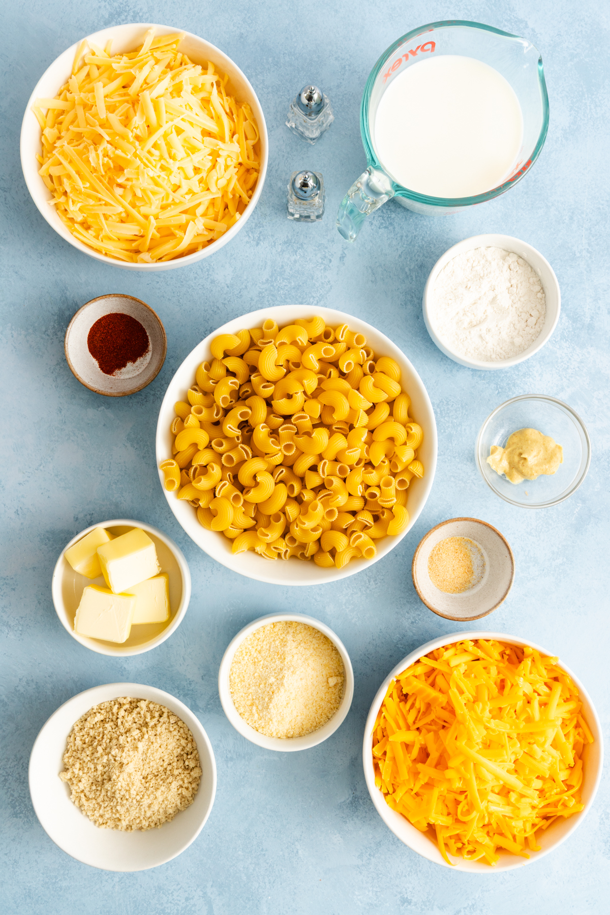 Ingredients for smoked gouda mac and cheese arranged on a countertop.